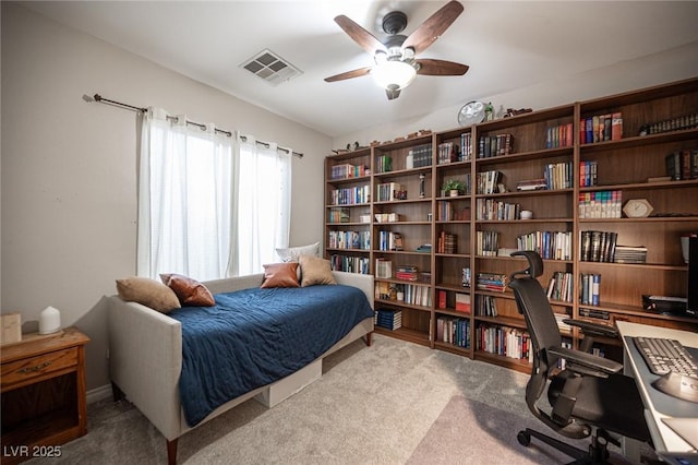 6937 Puetollano Dr, North Las Vegas, NV 89084 - carpeted bedroom with an office area