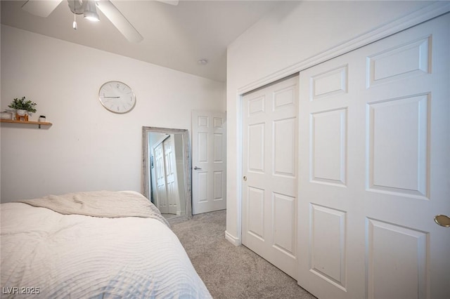 6937 Puetollano Dr, North Las Vegas, NV 89084 - bedroom featuring light colored carpet, a closet, and ceiling fan