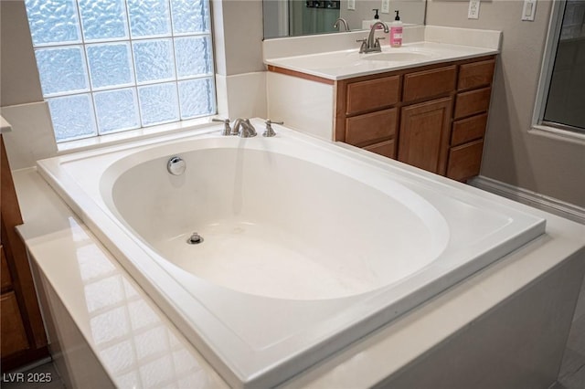 6937 Puetollano Dr, North Las Vegas, NV 89084 - bathroom with a bath and vanity