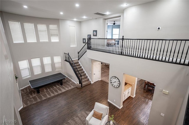 6937 Puetollano Dr, North Las Vegas, NV 89084 - stairs with wood finished floors, recessed lighting, and a ceiling fan