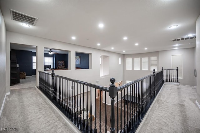 6937 Puetollano Dr, North Las Vegas, NV 89084 - corridor featuring carpet, an upstairs landing, and recessed lighting