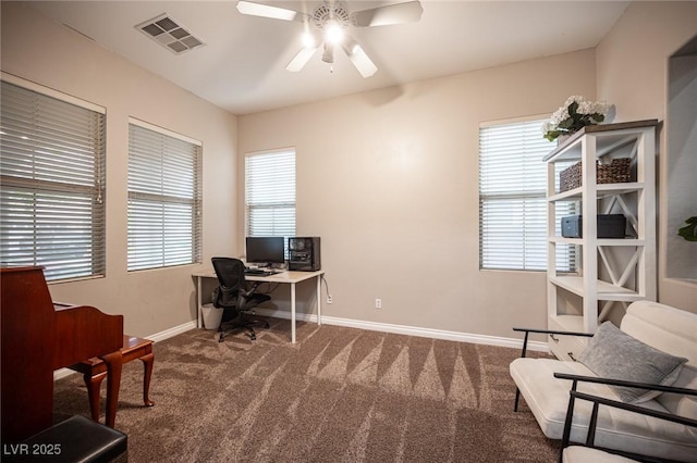 6937 Puetollano Dr, North Las Vegas, NV 89084 - home office with a ceiling fan and carpet floors