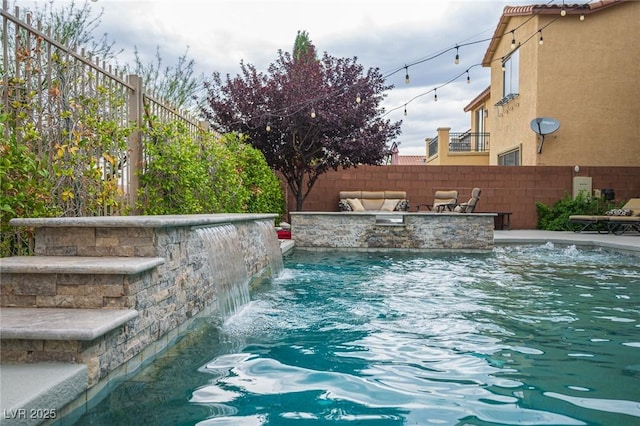 6937 Puetollano Dr, North Las Vegas, NV 89084 - view of pool with an outdoor kitchen