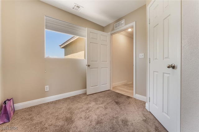 2912 Hot Cider Ave, North Las Vegas, NV 89031 - unfurnished bedroom featuring carpet flooring and baseboards