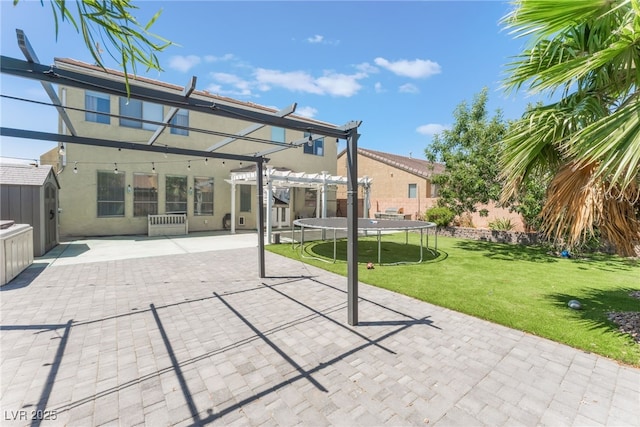 2912 Hot Cider Ave, North Las Vegas, NV 89031 - view of patio / terrace featuring a trampoline, a pergola, and a shed