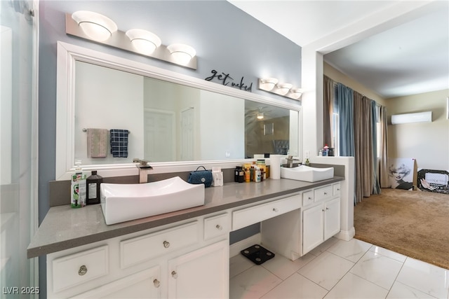2912 Hot Cider Ave, North Las Vegas, NV 89031 - bathroom featuring double vanity and a wall mounted air conditioner