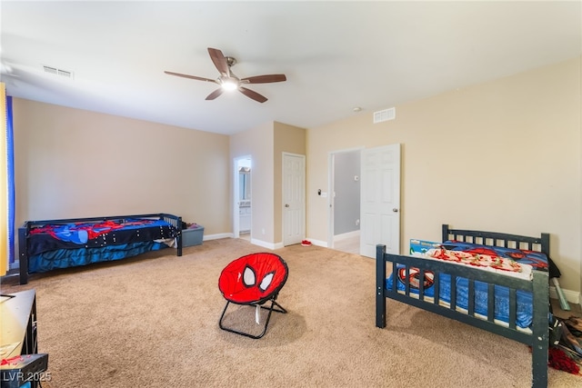 2912 Hot Cider Ave, North Las Vegas, NV 89031 - carpeted bedroom featuring a ceiling fan and connected bathroom