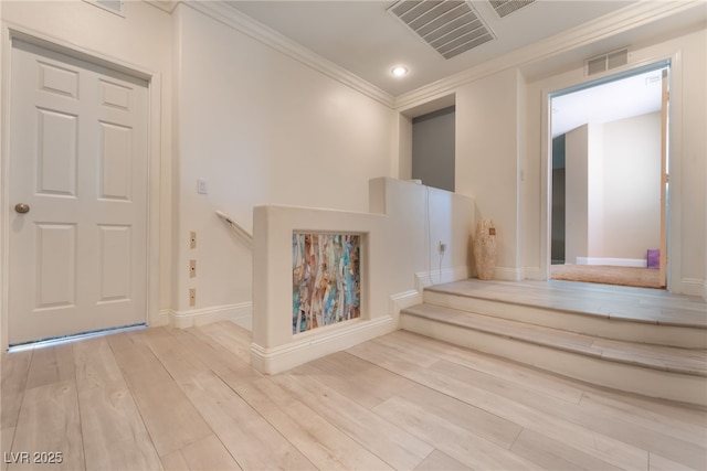2912 Hot Cider Ave, North Las Vegas, NV 89031 - entryway featuring ornamental molding, wood finished floors, and recessed lighting