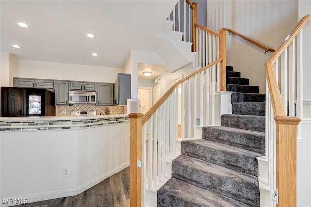 1073 Pleasure Ln Unit 2, Henderson, NV 89002 - stairway featuring wood finished floors and recessed lighting
