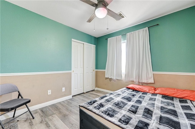 1073 Pleasure Ln Unit 2, Henderson, NV 89002 - bedroom with wood finished floors, a closet, and ceiling fan