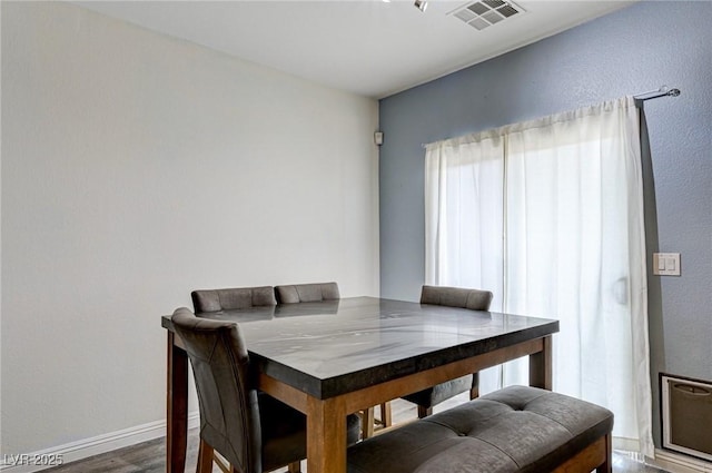 1073 Pleasure Ln Unit 2, Henderson, NV 89002 - dining area featuring wood finished floors and baseboards