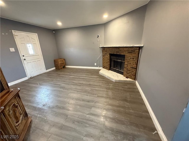 15 Washington Way, Henderson, NV 89015 - unfurnished living room with a fireplace, wood finished floors, and recessed lighting