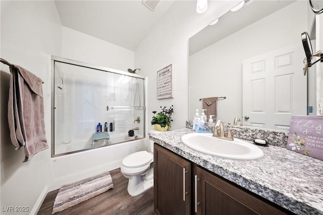 3603 E Umatilla Ave, Pahrump, NV 89061 - bathroom with vanity, wood finished floors, and bath / shower combo with glass door