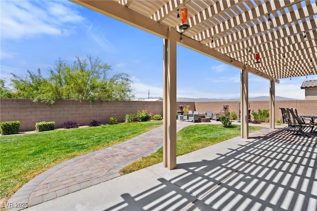 3603 E Umatilla Ave, Pahrump, NV 89061 - fenced backyard with a pergola and a patio