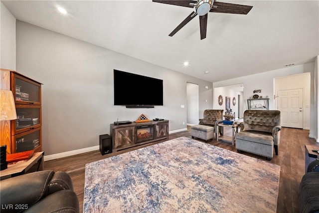3603 E Umatilla Ave, Pahrump, NV 89061 - living room featuring dark wood-style flooring, a ceiling fan, and recessed lighting
