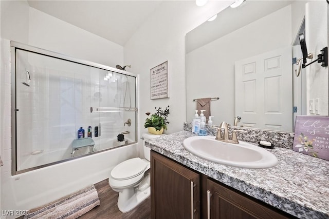 3603 E Umatilla Ave, Pahrump, NV 89061 - bathroom featuring vanity, combined bath / shower with glass door, and wood finished floors