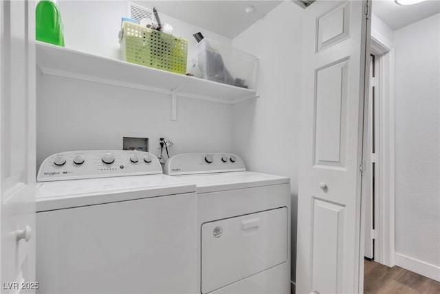 833 Aspen Peak Loop Unit 613, Henderson, NV 89011 - laundry room with washer and dryer and wood finished floors