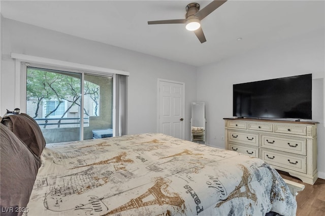 833 Aspen Peak Loop Unit 613, Henderson, NV 89011 - bedroom featuring access to outside, wood finished floors, and ceiling fan