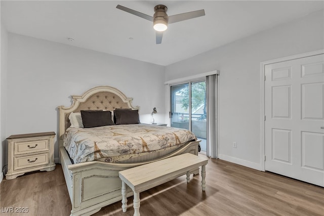 833 Aspen Peak Loop Unit 613, Henderson, NV 89011 - bedroom featuring access to outside, wood finished floors, and a ceiling fan