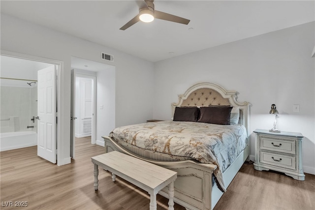 833 Aspen Peak Loop Unit 613, Henderson, NV 89011 - bedroom with light wood-style floors, ensuite bathroom, and ceiling fan