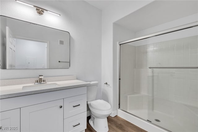 833 Aspen Peak Loop Unit 613, Henderson, NV 89011 - full bathroom featuring wood finished floors, a stall shower, and vanity