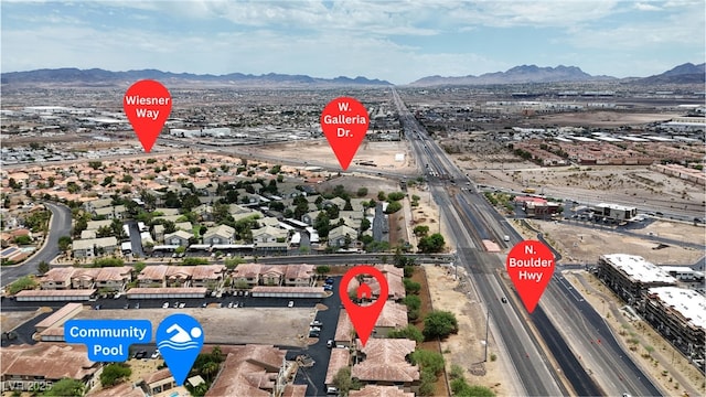 833 Aspen Peak Loop Unit 613, Henderson, NV 89011 - aerial perspective of suburban area featuring a mountainous background and a highway