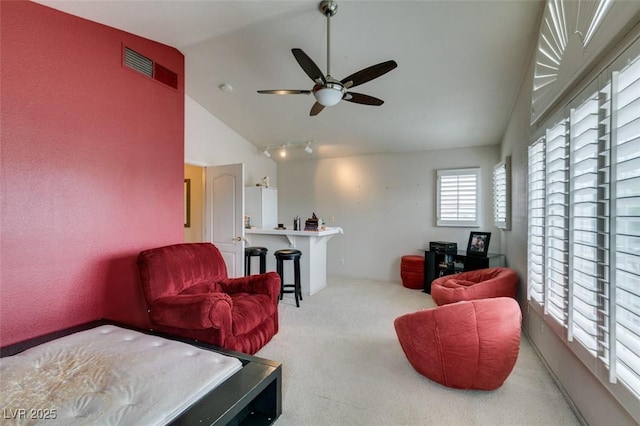 7836 Silver Plateau Ave, Las Vegas, NV 89128 - carpeted living area with vaulted ceiling and a ceiling fan
