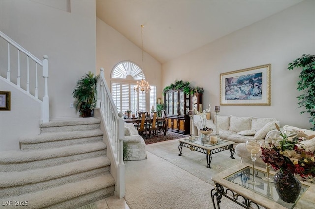 7836 Silver Plateau Ave, Las Vegas, NV 89128 - living area with high vaulted ceiling, stairs, and a chandelier