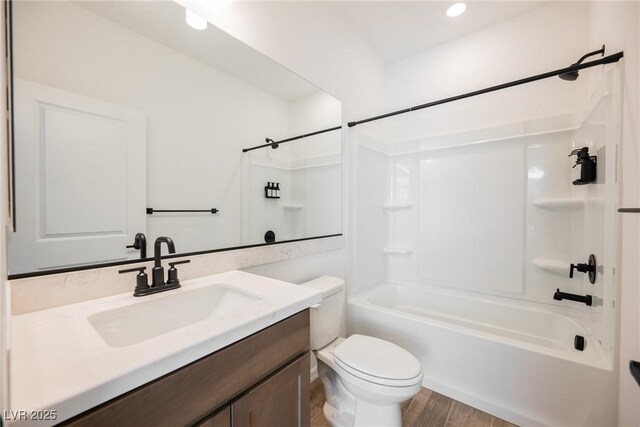 8478 Hawks View St, Las Vegas, NV 89113 - full bathroom featuring vanity, shower / tub combination, wood finished floors, and recessed lighting