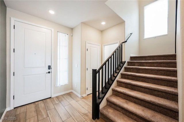 8478 Hawks View St, Las Vegas, NV 89113 - foyer entrance with stairs, plenty of natural light, recessed lighting, and light wood-style flooring