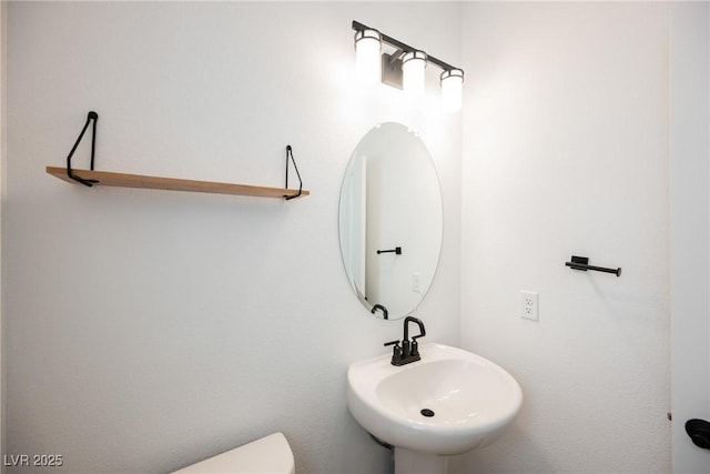 8478 Hawks View St, Las Vegas, NV 89113 - bathroom featuring a sink and toilet