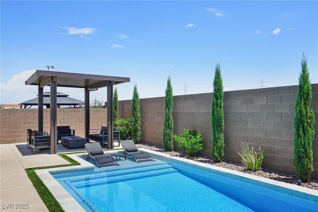 8478 Hawks View St, Las Vegas, NV 89113 - view of swimming pool featuring a gazebo, a fenced backyard, and a patio area