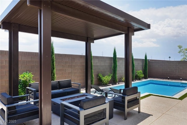 8478 Hawks View St, Las Vegas, NV 89113 - view of swimming pool featuring an outdoor living space with a fire pit, a patio area, and a fenced backyard