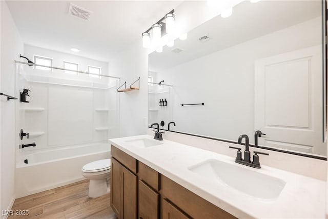8478 Hawks View St, Las Vegas, NV 89113 - full bath with wood finished floors, double vanity, and shower / tub combination