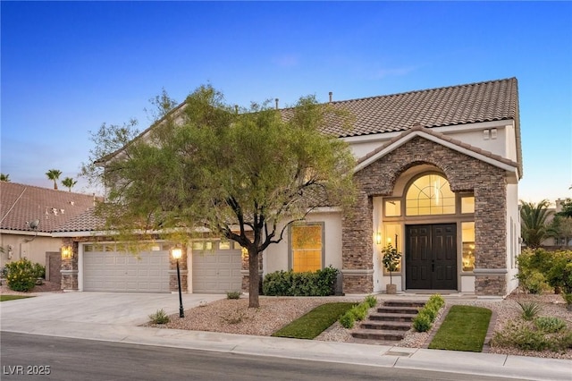 10707 Sleepy Mist Ct, Las Vegas, NV 89141 - mediterranean / spanish house featuring stone siding, stucco siding, concrete driveway, and an attached garage