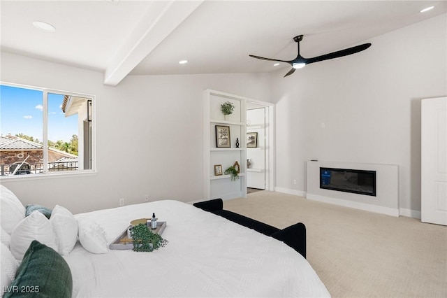 10707 Sleepy Mist Ct, Las Vegas, NV 89141 - carpeted bedroom with lofted ceiling, recessed lighting, a glass covered fireplace, and a ceiling fan