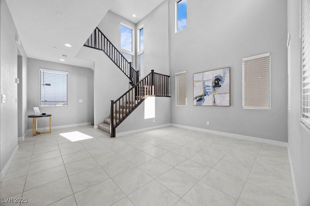 635 Pyrite Will St, Las Vegas, NV 89138 - tiled foyer with a high ceiling, stairway, healthy amount of natural light, and recessed lighting
