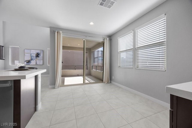 635 Pyrite Will St, Las Vegas, NV 89138 - unfurnished dining area featuring baseboards and light tile patterned floors