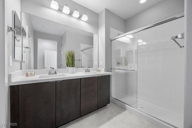 635 Pyrite Will St, Las Vegas, NV 89138 - bathroom with a shower stall, double vanity, and tile patterned floors