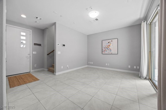 635 Pyrite Will St, Las Vegas, NV 89138 - foyer entrance with light tile patterned floors and stairway