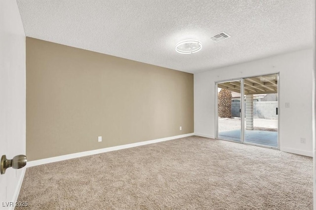 3908 Longfellow St, Las Vegas, NV 89115 - empty room featuring carpet and a textured ceiling