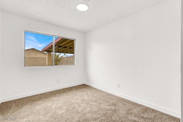 3908 Longfellow St, Las Vegas, NV 89115 - carpeted empty room with baseboards and a textured ceiling