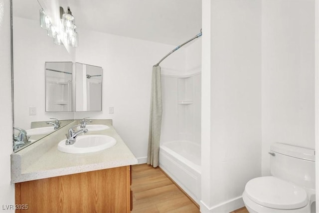 3908 Longfellow St, Las Vegas, NV 89115 - bathroom featuring double vanity, shower / bath combination with curtain, and wood finished floors