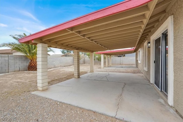 3908 Longfellow St, Las Vegas, NV 89115 - fenced backyard with a patio
