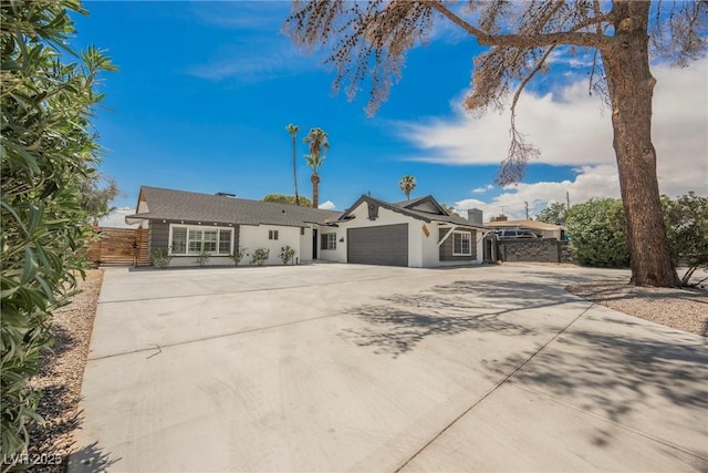 1712 E Oakey Blvd, Las Vegas, NV 89104 - single story home featuring a garage, concrete driveway, and stucco siding