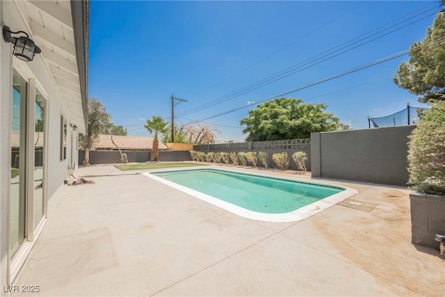 1712 E Oakey Blvd, Las Vegas, NV 89104 - view of swimming pool with a fenced backyard and a patio