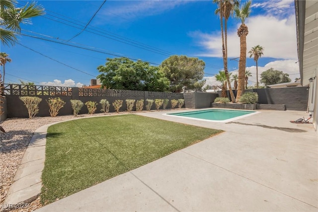 1712 E Oakey Blvd, Las Vegas, NV 89104 - fenced backyard with a patio