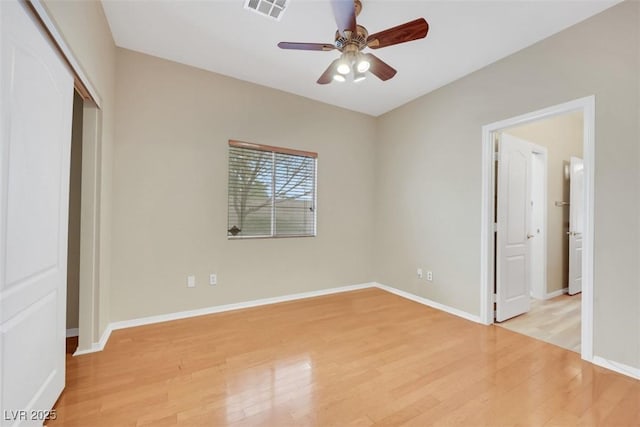 1078 Broomfield Dr, Henderson, NV 89074 - unfurnished bedroom with light wood-style flooring, a closet, and ceiling fan