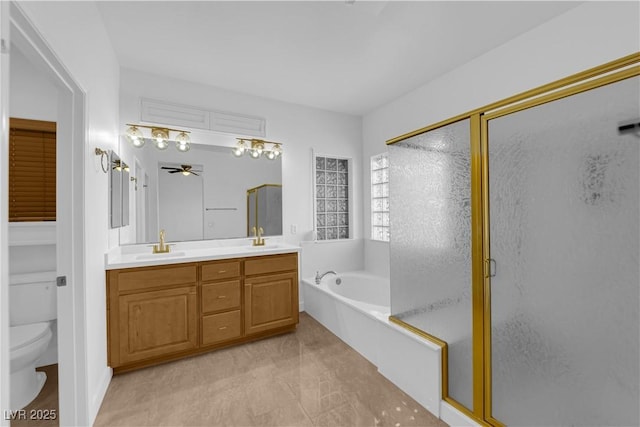 2167 Fairweather St, Henderson, NV 89052 - full bath with a garden tub, a stall shower, double vanity, and ceiling fan