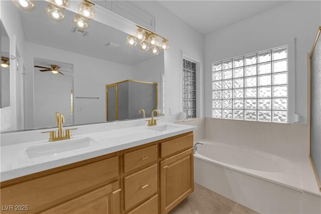 2167 Fairweather St, Henderson, NV 89052 - full bath with a bath, a stall shower, double vanity, and ceiling fan